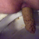 A female shitting ass on a toilet from a close-up perspective. This is a nice big poop. Full audio included.